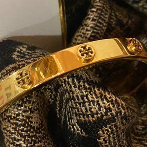Tory Burch Gold Tone Logo Stud Bracelet.